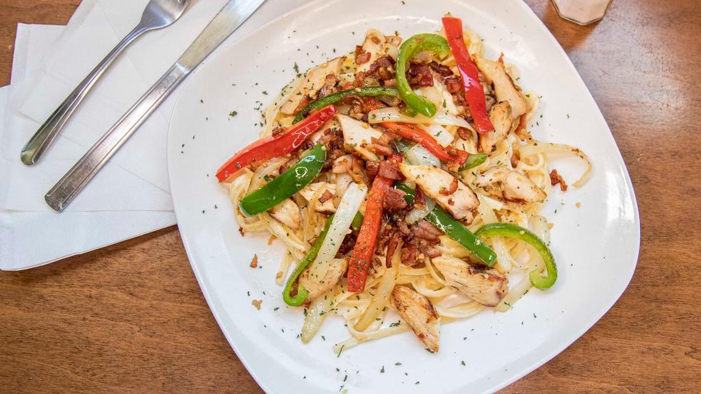Carbonara · Sautéed bacon, chicken, caramelized onion, bell peppers, and alfredo sauce tossed with linguini.
