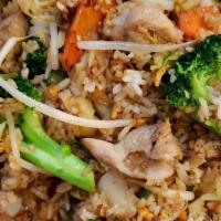 Chicken Fried Rice · Served with egg onion carrot bean sprouts peas broccoli cabbage and celery.