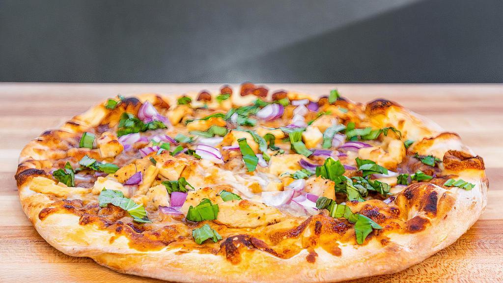 Gluten-Free Chicken Barbecue Pizza · House special gluten free crust, grilled chicken bites, red onions, green pepper, mushrooms, minced garlic, special BBQ sauce, and our premium mozzarella cheese.