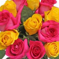Debi Lilly Dozen Rose Bouquet (Vibrant Mix) · Dozen Roses wrapped in a kraft wrap. (Two color varieties in the bunch)