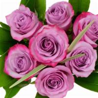 Debi Lilly Mini Chic Rose Bouquet · Half dozen mini rose bunch with greens, wrapped in a kraft wrap.