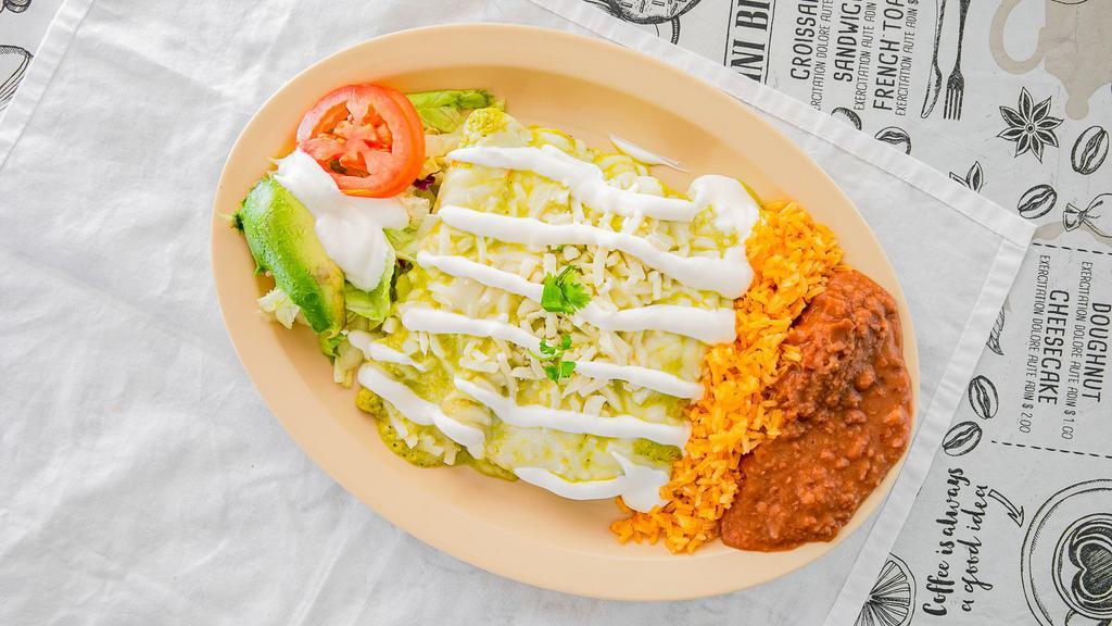 Enchiladas Verdes · Served with rice and beans.