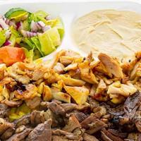 Shawarma Combo · Beef & chicken shawarma mixed comes with rice and salad.