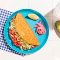 Chalupa · Fried tortilla shell filled with refried beans, lettuce, and tomato.