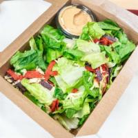 Southwest Caesar (Half) · Romaine lettuce tossed with pepper jack cheese, tortilla strips and chipotle Caesar dressing.
