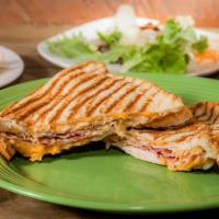 Turkey Bacon Ranch Panini · Sliced turkey breast, smoked bacon, cheddar cheese and our homemade creamy ranch spread on o...
