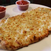 Cheesy Garlic Bread · Freshly baked bread, covered with melted shredded mozzarella cheese, garlic and topped with ...
