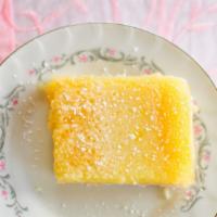 Lemon Bar · A delicious buttery crust with a tart lemon topping