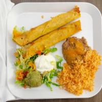 Flauta Dinner · Two ground beef or pulled chicken corn tortillas, rolled double, fried golden crisp. w/ rice...