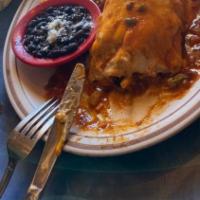 Order Burritos (Three) · Three soft flour tortillas filled with choice of beans, beef or chicken combination. Garnish...