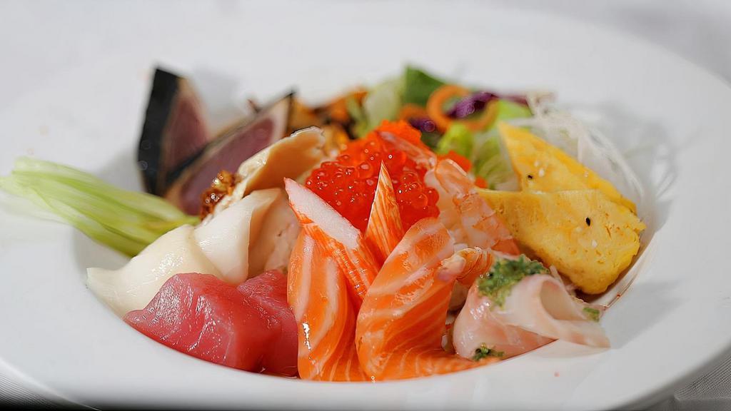 Ciao Chirashi · Salmon, scallop, ikura and sweet shrimp on a bed of seasoned sushi rice.