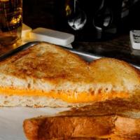 Grilled Cheese · American cheese on Texas toast.