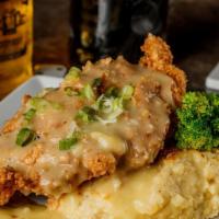 Chicken Fried Chicken · Original or spicy. Served with garlic sautéed broccoli and mashed potatoes. Substitute mashe...