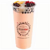 Qq Happy Family Milk Tea · This item comes with Pearls, Mini pearls, Lychee, Herb jelly, Red Bean, Lychee Jelly