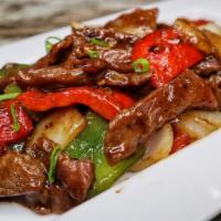 Pepper Steak · Sauteed beef with bell pepper and onions in a brown sauce.