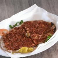 Lahm Bi Ajeen (Meat Pie) · Ground beef, onions and spices baked on fresh dough