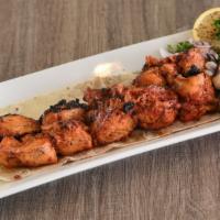 Chicken Tikka · Two skewers of marinated chicken chunks
Served with one flatbread