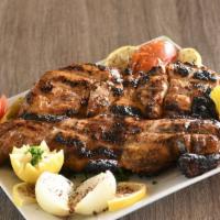 Whole Char Grilled Chicken  · Iraqi Style marinated grilled chicken over charcoal. Please allow 25-30 minutes for preparat...