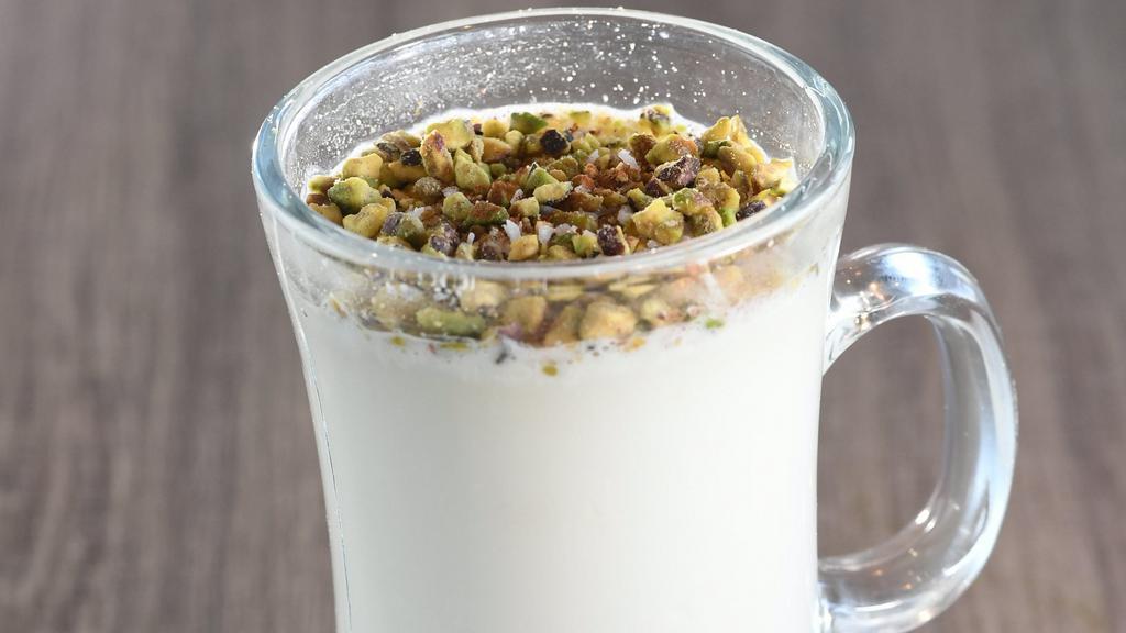 Sahlab · Hot drinkable dessert made with milk, sage, flower water, starch and topped with pistachios