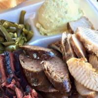 3 Meat Plate · Meat Options between Chicken,  Brisket, Rib, & Homemade Sausage with 2 sides & 2 slice of br...