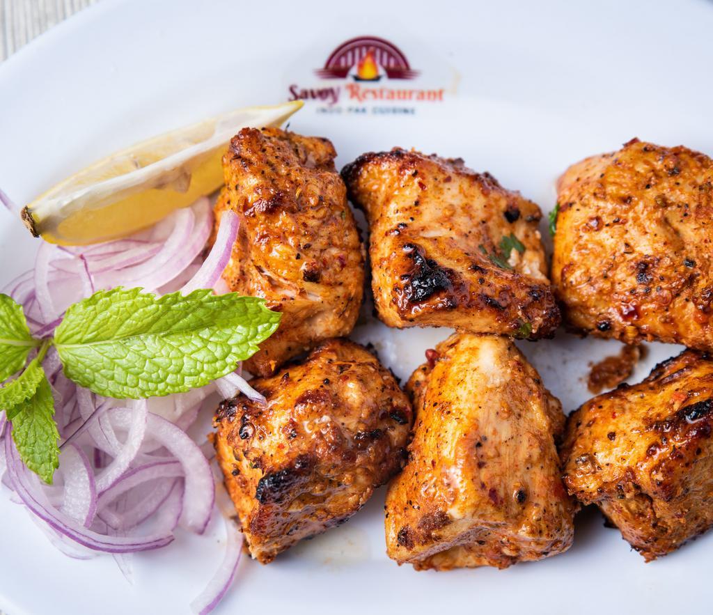 Chicken Boti (Spicy/Mild) · Boneless chicken breast cubes marinated in a mixture of yogurt and special blend of in-house spices grilled to perfection.