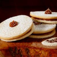 Alfajor · One home made shortbread cookie with home made caramel filling and powdered sugar on top. 
(...