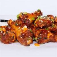 Kpop Wings · sweet and spicy glazed chicken wings with sriracha mayo and topped with wasabi furikake and ...