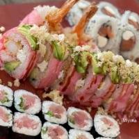 Sushi Roll Combo · Three sushi rolls - salmon and cream cheese roll, tuna roll, and any specialty roll.