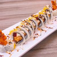 Coco Shrimp Roll · Shrimp toasted coconut, cream cheese, yuala, topped with mango and coconut.