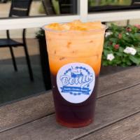Thai Tea · A blend of black teas and spices combined with creamy milk