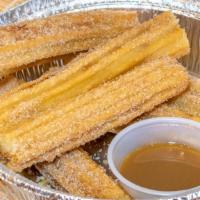 Classic Churros · Hot fresh Churros (6pcs) your choice of plain or cover with sugar and cinnamon. Come with 1 ...
