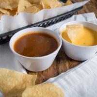 Chile Con Queso With Chips · Chile con queso with chips. served with choice of meat tacos.