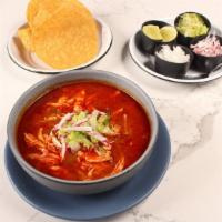 Pozole Mañanero · By Potzollcalli™. With a choice of chicken or pork, either rojo or blanco.
