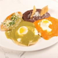 Divorciados · 2 fried eggs over tortillas, salsa verde + salsa roja, served w/Bean Tlacoyo and refried bea...