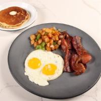 Huevos Usa · Eggs (3) with bacon + Pancakes. You can add sausage, bacon, refried beans, guac or breakfast...