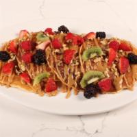 Dulce De Leche Pancakes · Served w/berries + pecans + grade a maple syrup. You can add sausage, bacon, breakfast potat...