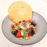 Greek Yogurt + Berries · Served w/granola, honey, chia seeds + Yummi healthy cookie