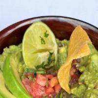 Good Karma Guacamole  · Fresh avocados blended with tomatoes, onions, cilantro, serrano chiles and lime. 50¢ donated...