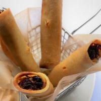 Bbq Pork Taquitos · Crispy corn tortilla rolled with a pulled pork filling. Served with pineapple habanero BBQ s...