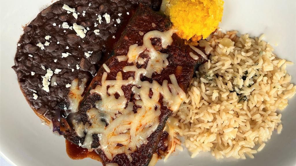 Cheese Enchiladas · Two each - Jack cheese blended with a touch of grated red onion. Rolled in a corn tortilla and topped with choice of 3-chile red sauce or tomatillo (green sauce)  with coconut lime rice, smoky black beans & sweet corn cake