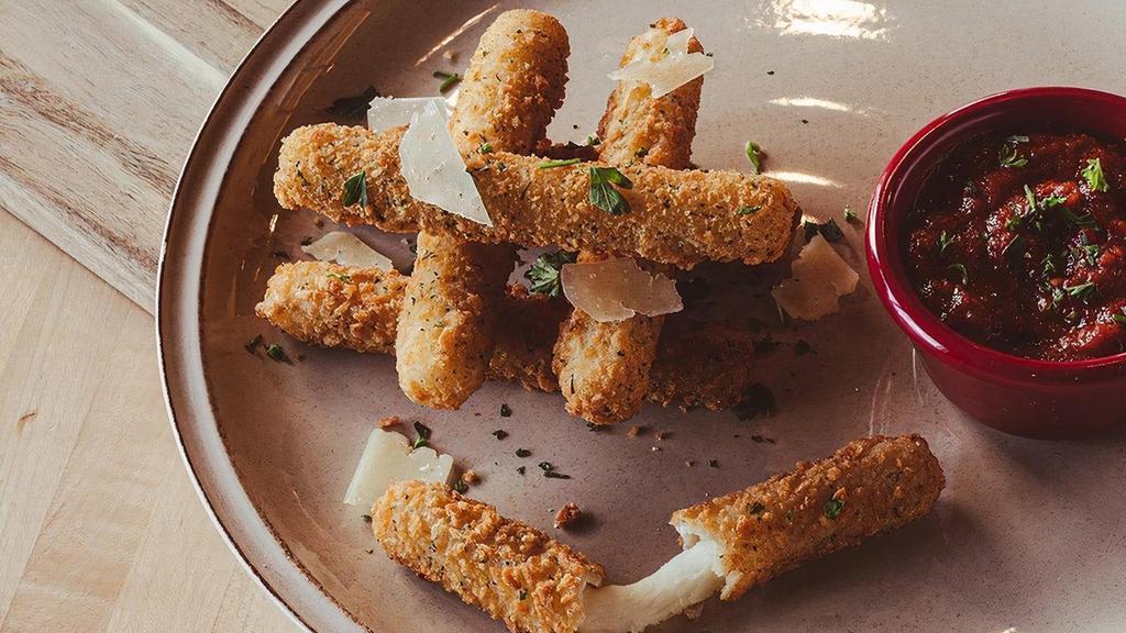 Mozzarella Sticks · Breaded and fried, served with signature red sauce.