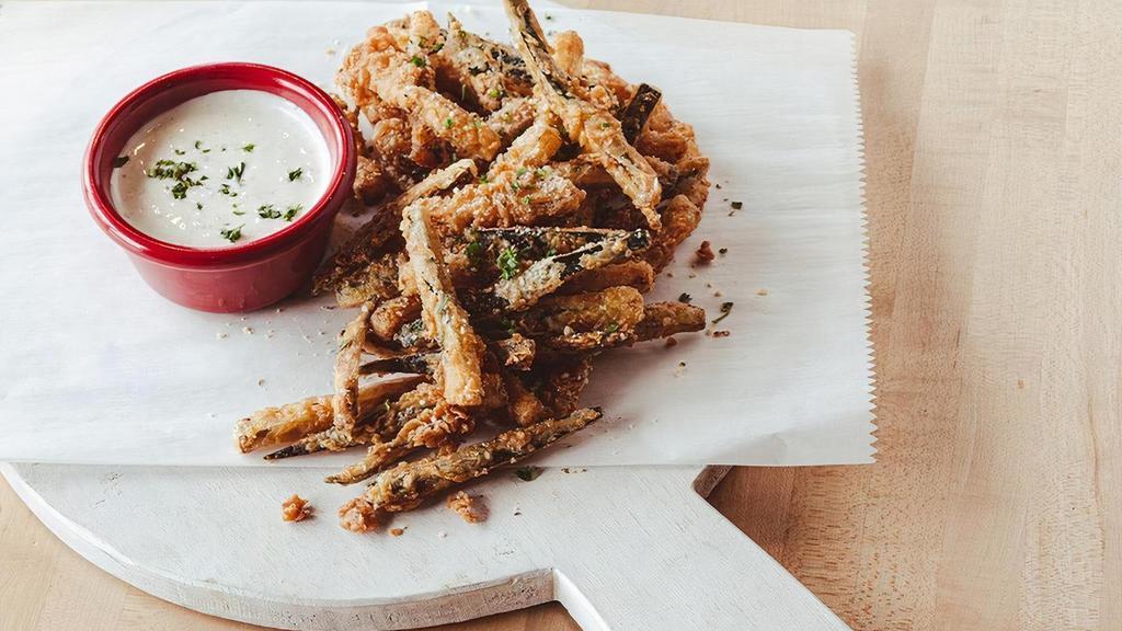 Fried Zucchini · Hand-battered fresh zucchini topped with parmesan seasoning blend. Served with ranch dressing.