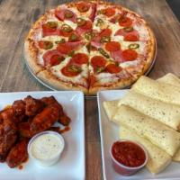 Family Pack One · One Large 3-topping Pizza, 1 LB wings, breadsticks and marinara. ranch not included