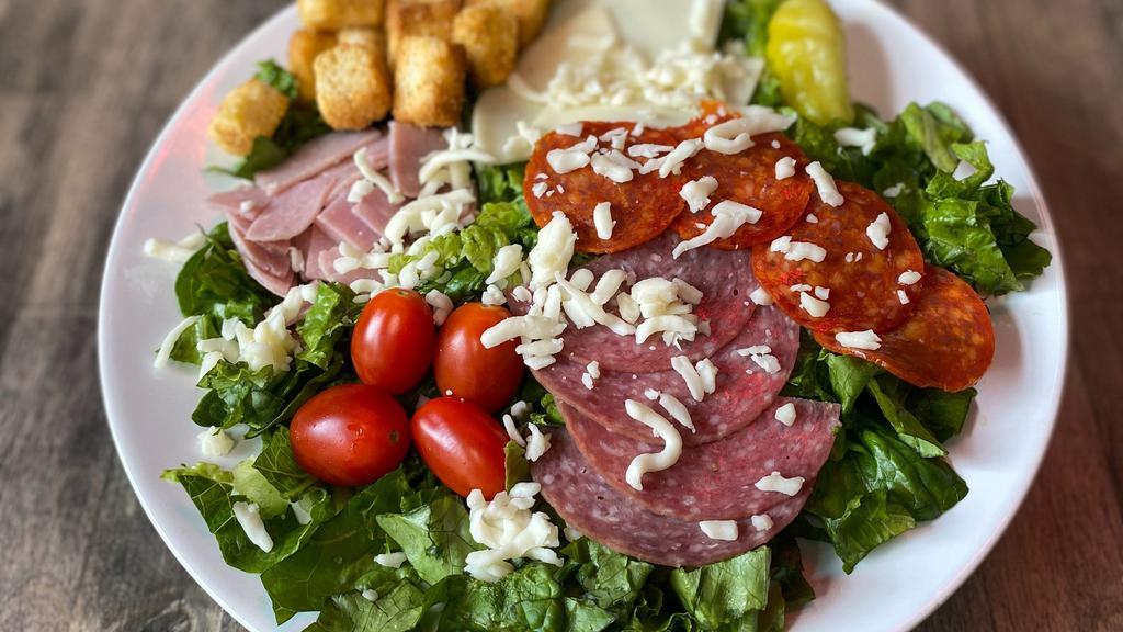Antipasto Salad · Blend of romaine and green leaf lettuce, salami, pepperoni, ham, cherry tomatoes, provolone and mozzarella, and pepperoncini