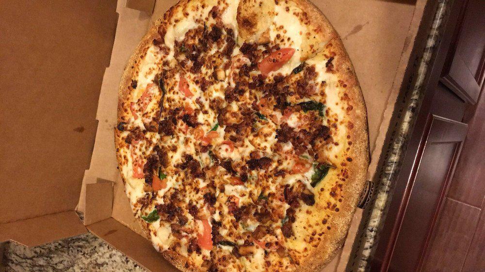 Great White Slice · alfredo sauce, chicken, bacon, roma tomatoes, spinach
