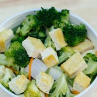 Vegetable Pho · Make it vegan. Vegetable broth with baked tofu, veggies & rice noodles (32 oz only).