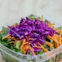 Side Salad · Gluten-free, make it vegan. Chopped green leaf lettuce, red cabbage & carrots with dressing.