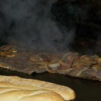 Philly Cheesesteak (Large) · (ribeye steak, mushrooms & onions)