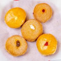 Rich Special Donut (Honey Peanutbutter) · Cinnamon Sugar Donut With Special filling Inside.