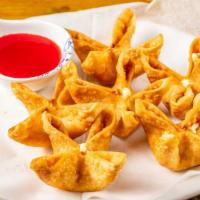 Blue Crab And Cheese Wontons  · Six pieces. Crispy wonton filled w. cream cheese, onion ,crab& carrot w. sweet-n-sour sauce.